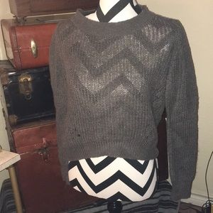 A semi crop top sweater
